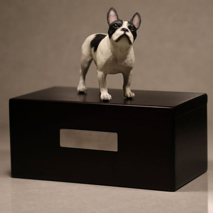 Personalized wooden dog cremation urn for ashes with a black and white French Bulldog statue